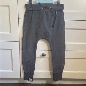 Six Hugs & Rock ‘N Roll Gray Jogger Pants with Zipper Detail